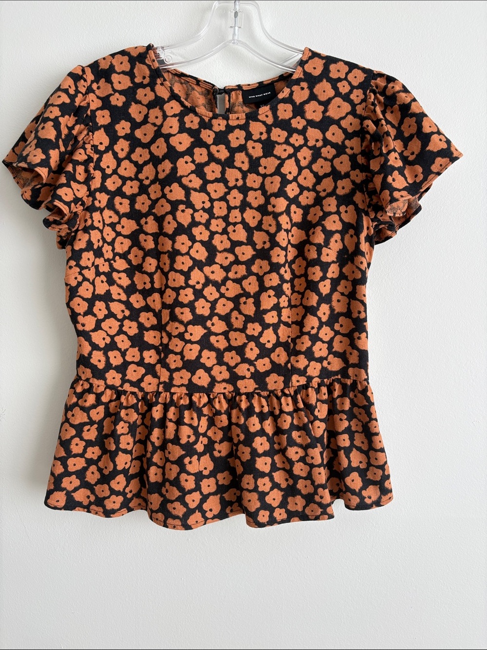Who What Wear Black Peplum Top with Orange Floral Print
